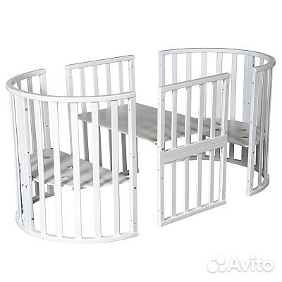 Круглая кроватка с маятником