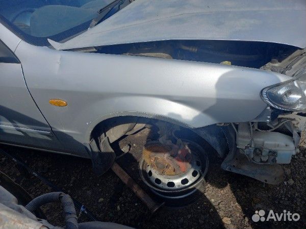 Mazda familia крыло переднее правое