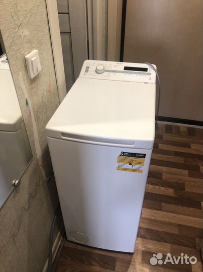 Стиральная машина с вертикальной загрузкой