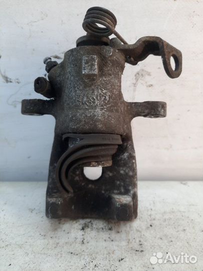 Суппорт тормозной задний правый Opel Astra