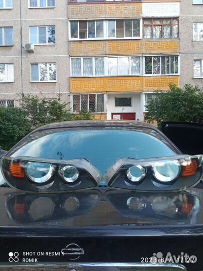 Nissan Almera N16 стекло фары