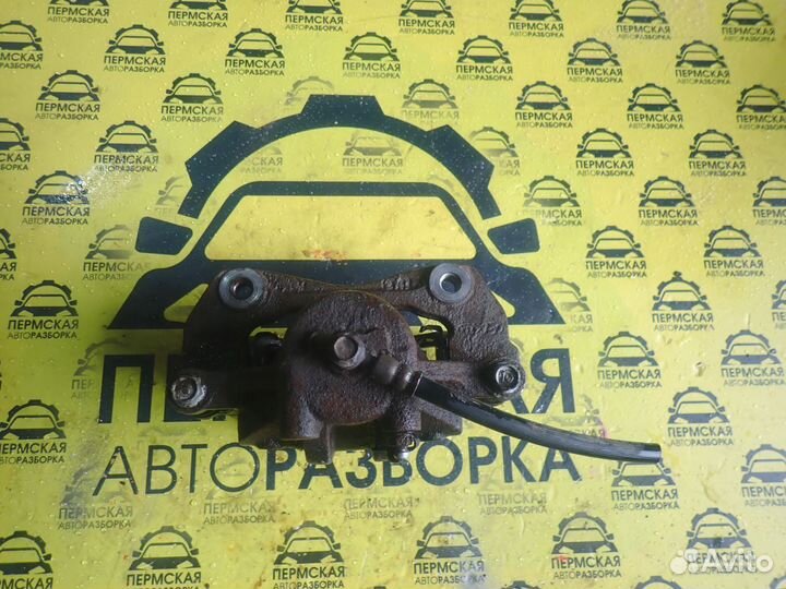 Суппорт тормозной передний правый Kia Cerato 2