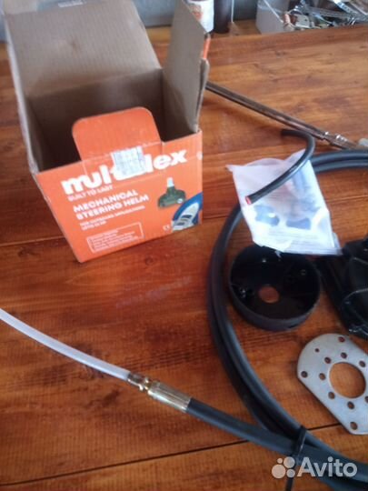 Руль и трос для лодочного мотора