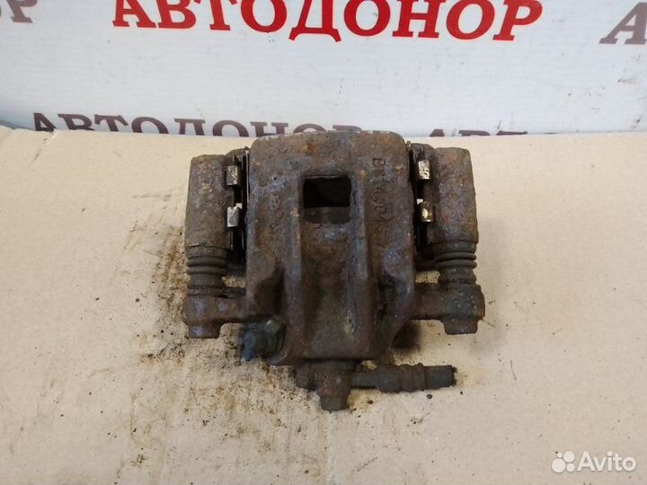 Суппорт тормозной задний левый Hyundai Santa Fe