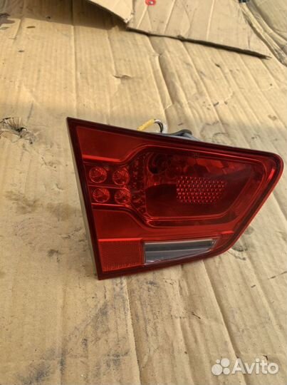 Фонарь левый в крышку багажника Kia Cerato 2