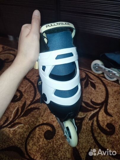 Роликовые коньки