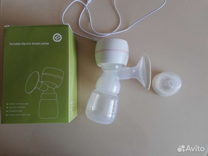 Молокоотсос электрический новый