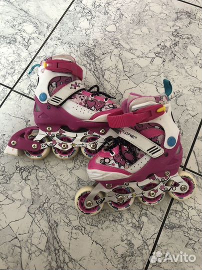 Роликовые коньки