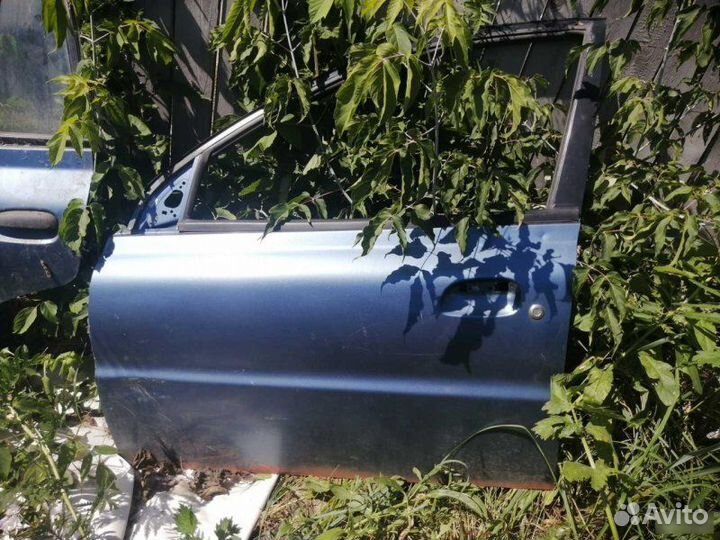 Дверь левая Kia Rio