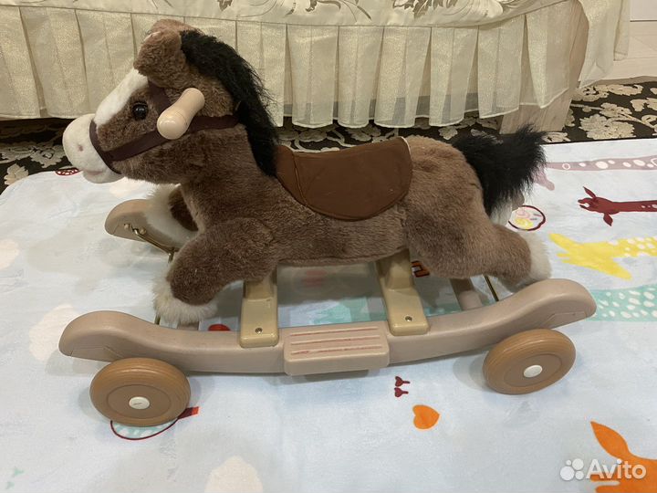 Детская каталка лошадь
