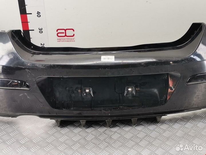 Бампер задний для Opel Astra H 24460353