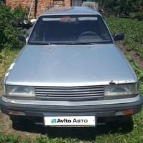 Nissan Bluebird 2.0 MT, 1989, битый, 100 000 км, с пробегом, цена 35 000 руб.