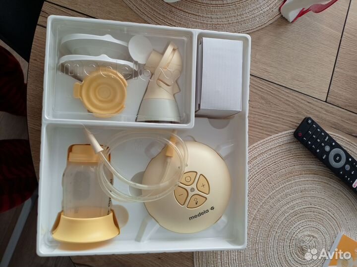 Молокоотсос электронный Свинг Флекс