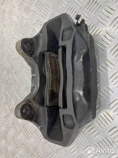 Суппорт тормозной передний правый Volkswagen