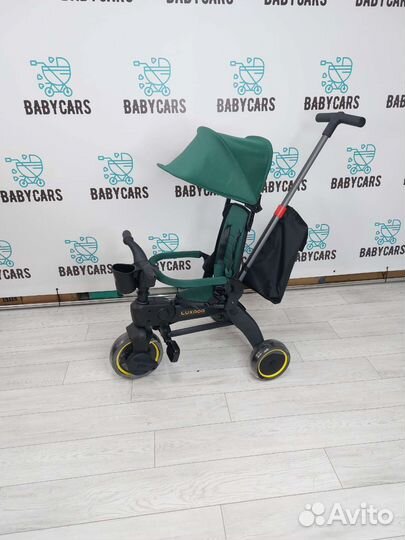 Новый велосипед коляска с ручкой, аналог Doona