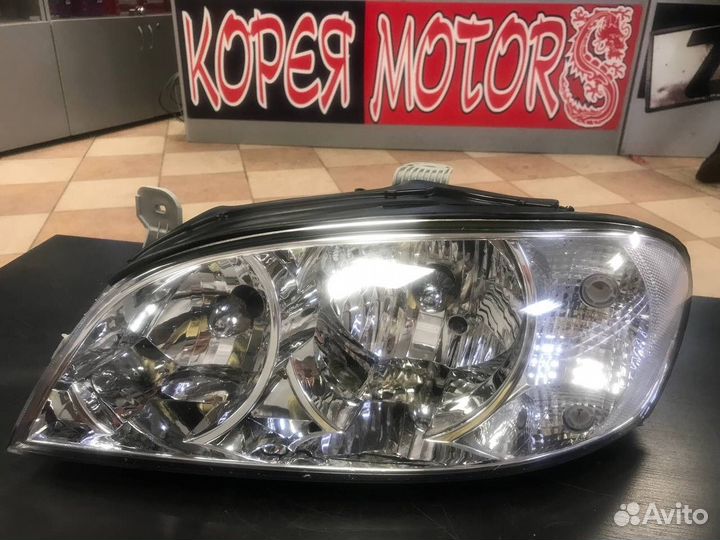 Фара левая kia spectra