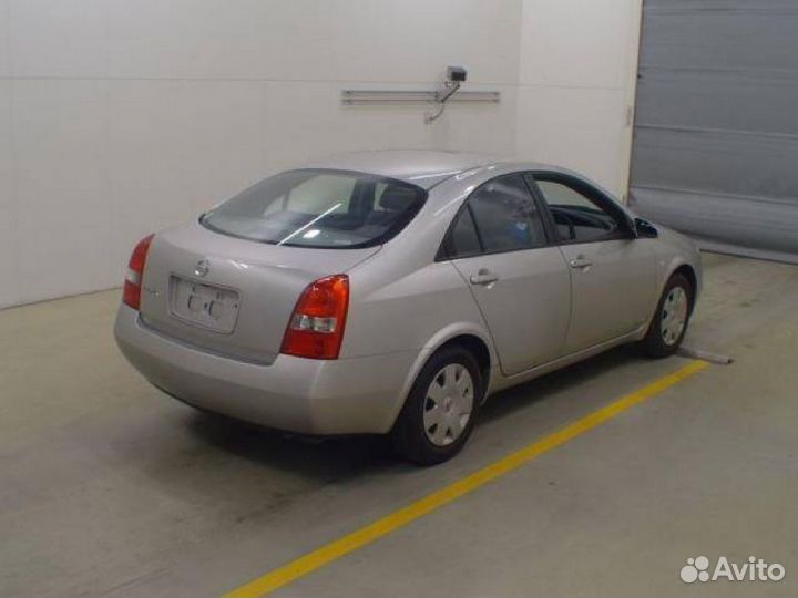 Суппорт тормозной задний правый Nissan Primera