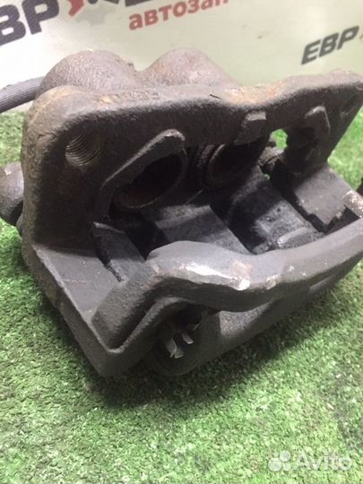 Суппорт тормозной передний левый Mazda Cx-7