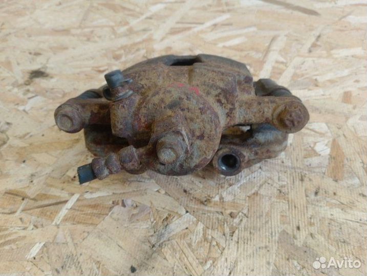 Суппорт тормозной передний левый Chevrolet Lanos