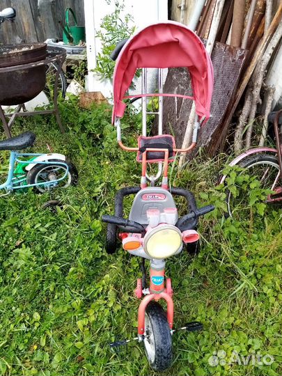 Трехколесный детский велосипед на ручке
