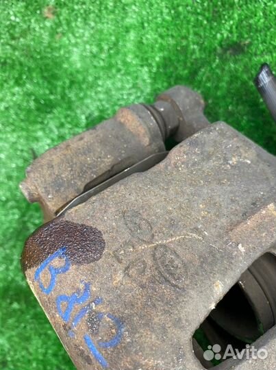 Суппорт тормозной передний правый Kia Ceed ED