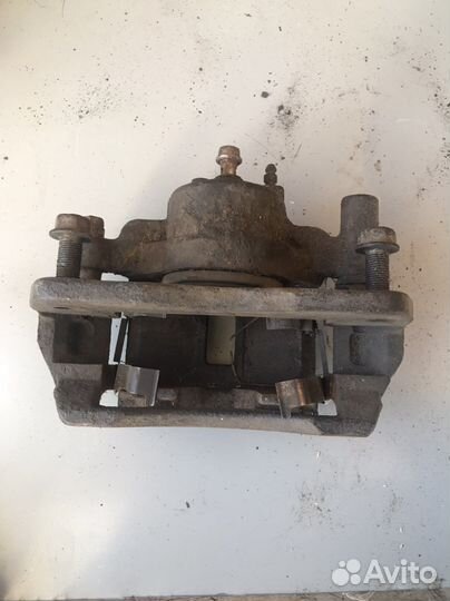 Суппорт передний Мазда 626ge