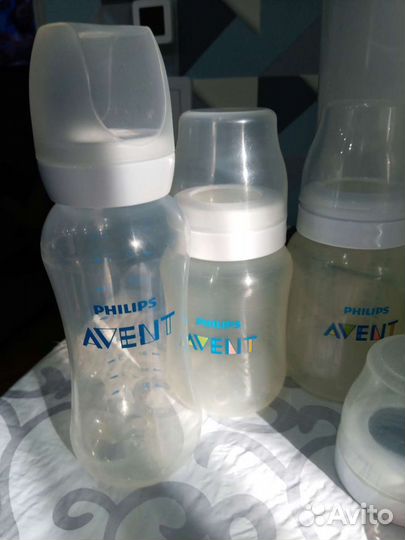 Бутылочки для кормления и стерилизатор