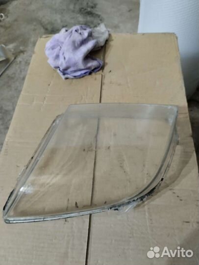 Стекло левой фары Ford Fusion