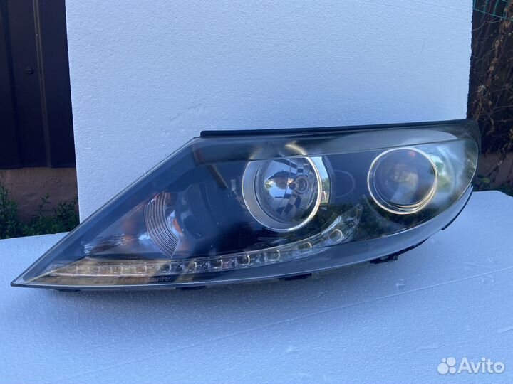 Фара левая Kia Sportage 3 с дхо