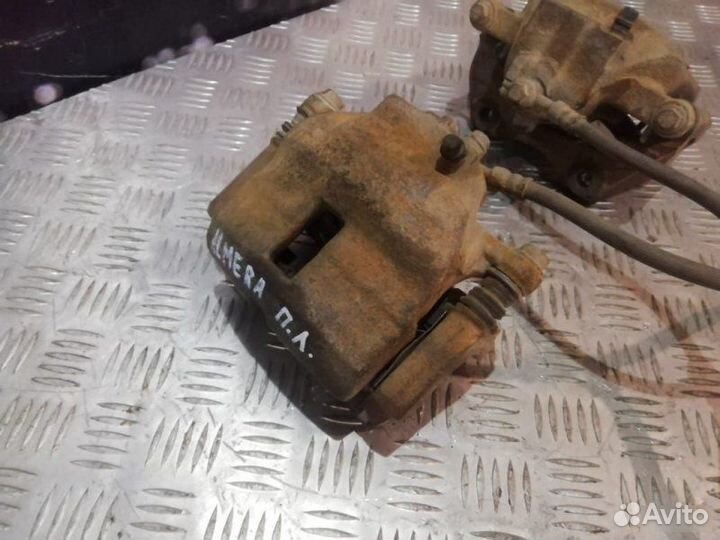 Суппорта передняя Nissan Almera N16 1.5 2000-2006