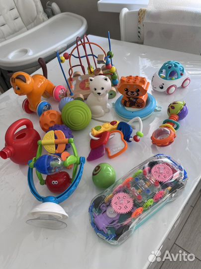 Игрушки погремушки тактилики развивающие