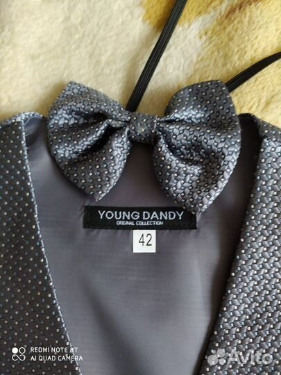 Жилет и бабочка для мальчика,б/у мало в отличном с