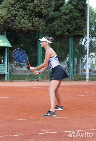 Тренер по большому теннису