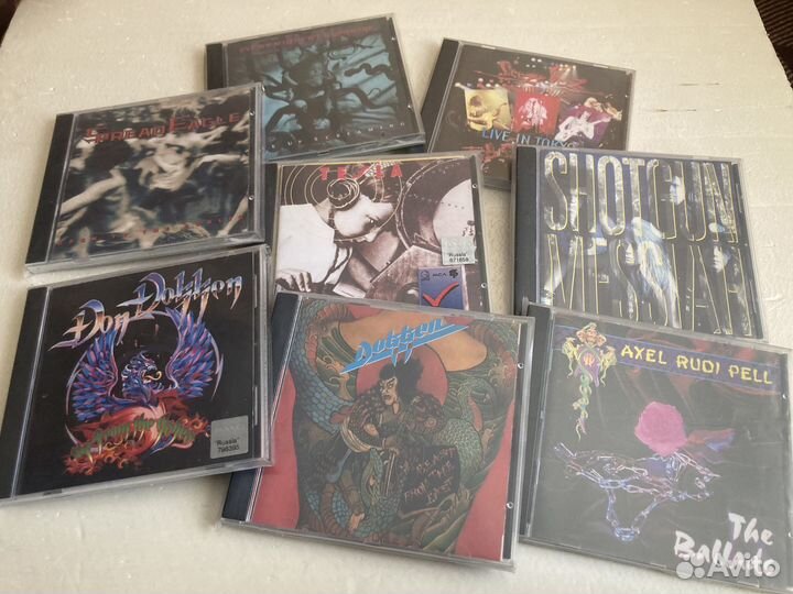 Компакт диски фирма(Tesla-Spread Eagle-Dokken)