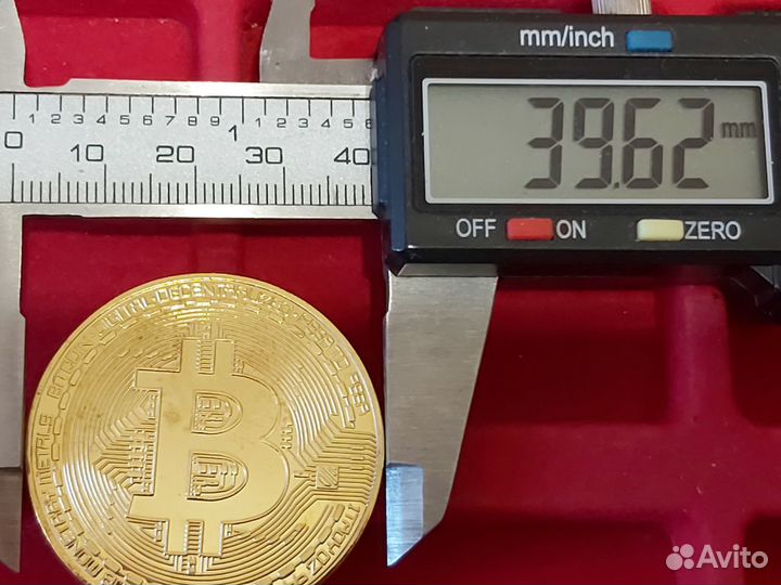 Монетный знак Биткоин