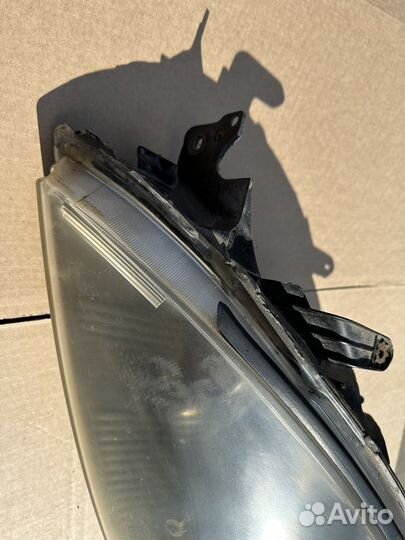 Фара левая Mitsubishi Lancer 9