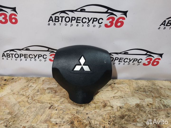 Подушка безопасности водителя Митсубиси Лансер 10