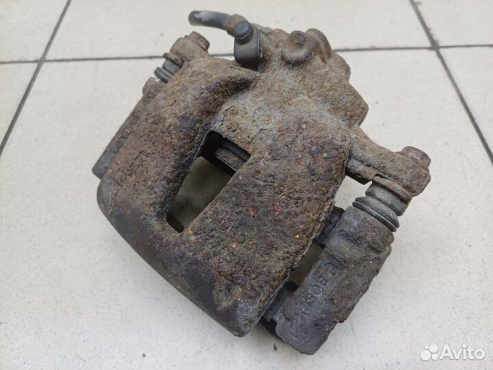 Суппорт передний правый Opel Corsa D (3D) 1.2