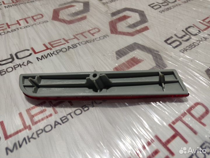 Отражатель в бампер задний левый Lancer X