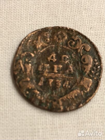 Деньга 1734 перечекан из копейки 1724