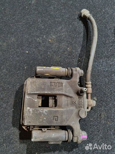 Суппорт тормозной задний правый Nissan X-Trail T31