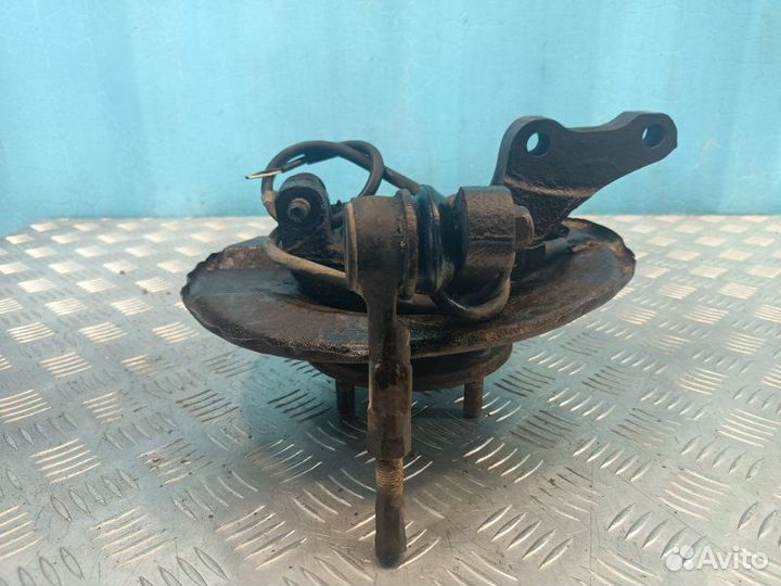 Кулак поворотный передний правый Mitsubishi Lancer