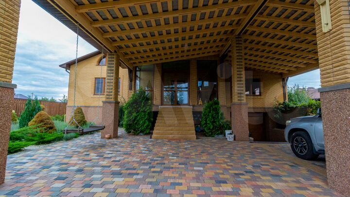 Коттедж 424 м² на участке 15 сот.