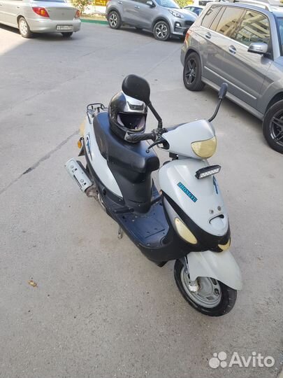 Мопед на ходу