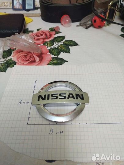 Эмблема nissan