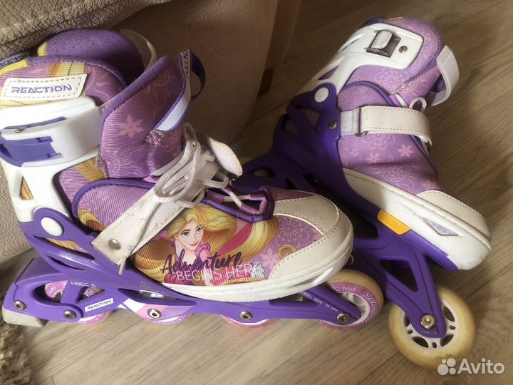 Роликовые коньки