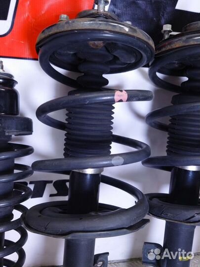 Стойки амортизатора Mitsubishi Outlander XL