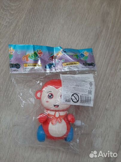 Игрушка заводная новая