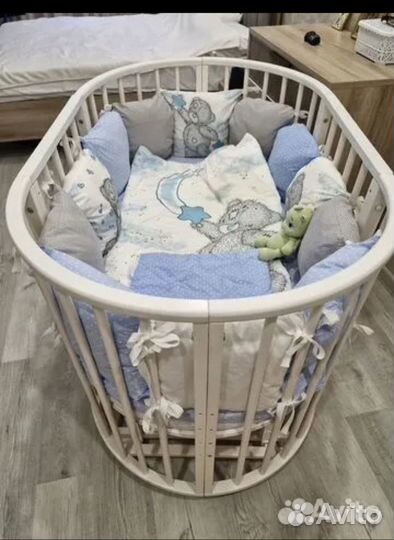 Детская кроватка с маятником