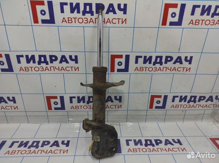 Амортизатор передний левый Toyota Avensis (T250) 4